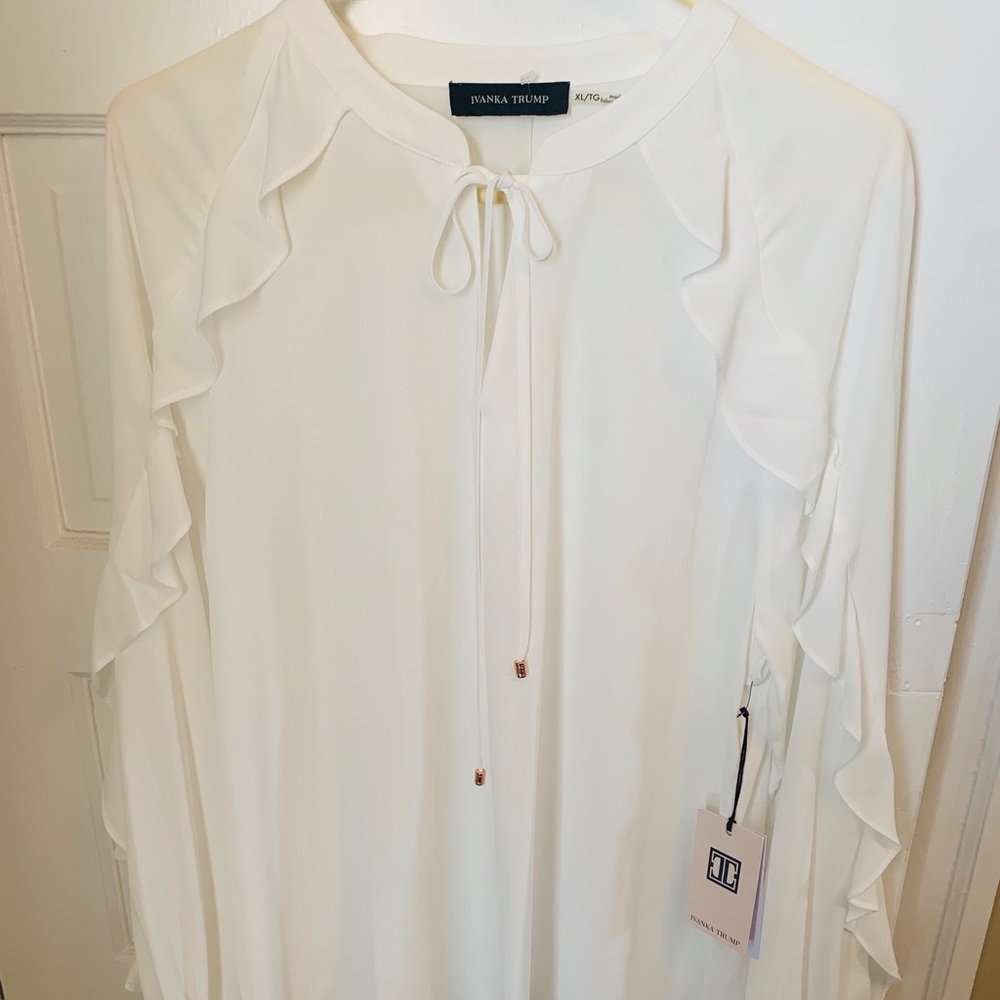 Ivanka Trump white blouse with details on front
